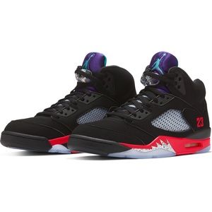 black jordans with purple